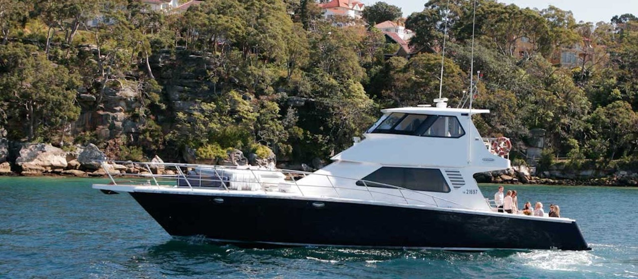 Luxury motor yacht State of the Art for hire on Sydney Harbour, up to 35 guests